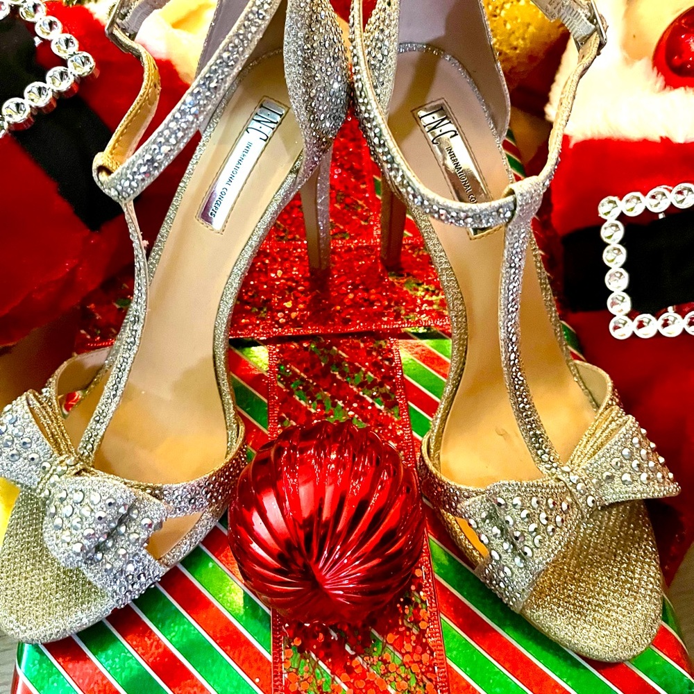 Beautiful Silver Bejeweled INC Sandals perfect for a night out or an event!